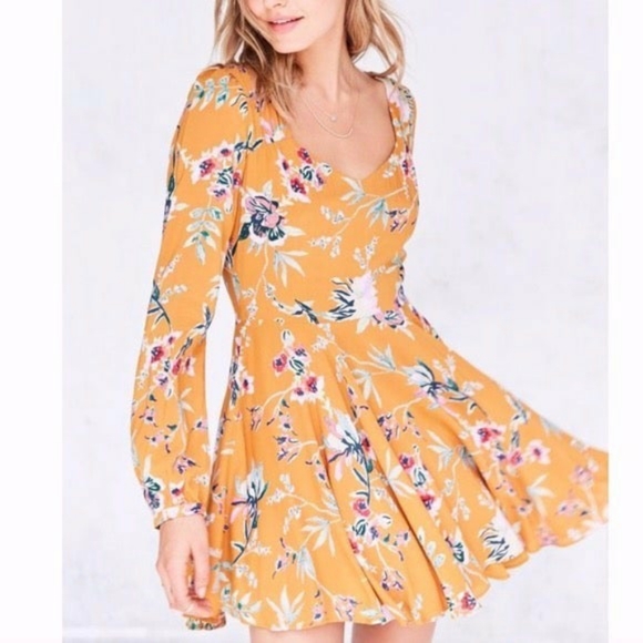 yellow fit and flare dress with sleeves